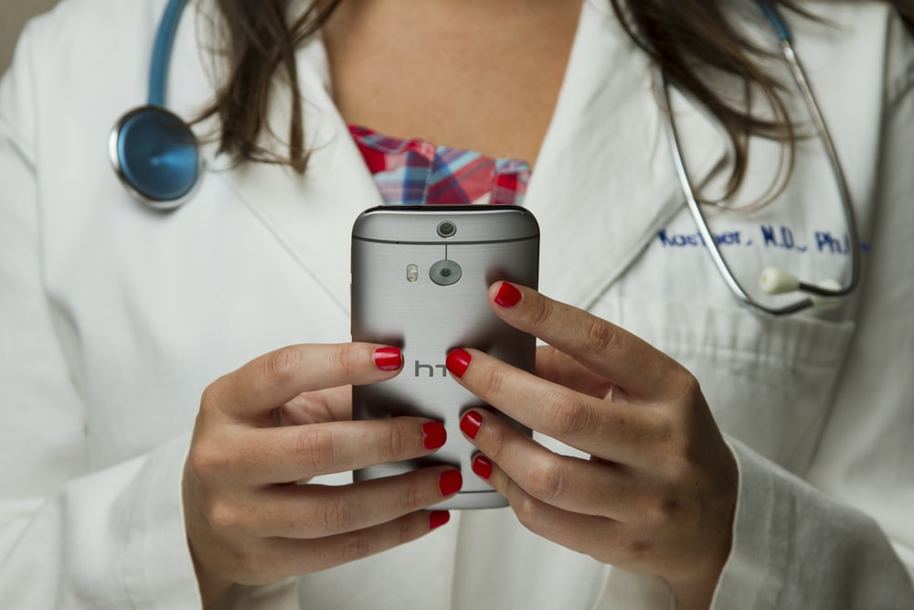 A doctor using a smartphone
